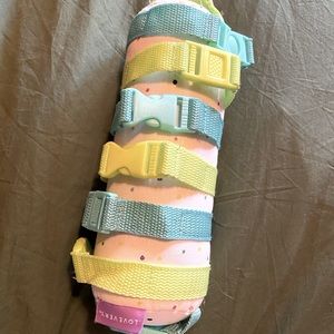 Lovevery organic cotton buckle barrel toy